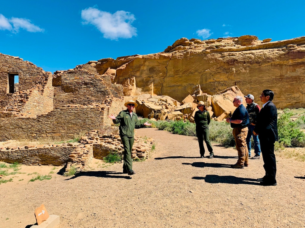(Jared Touchin/Navajo Nation via AP)This photo provided by the Navajo Nation, Interior Secretary David Bernhardt, third from left, tours Chaco Culture National Historical Park  in NEw Mexico on Tuesday, May 28, 2019. U.S. Sen. Martin Heinrich of New Mexico is at Bernhardt's right. Navajo Nation President Jonathan Nez is on the far right.