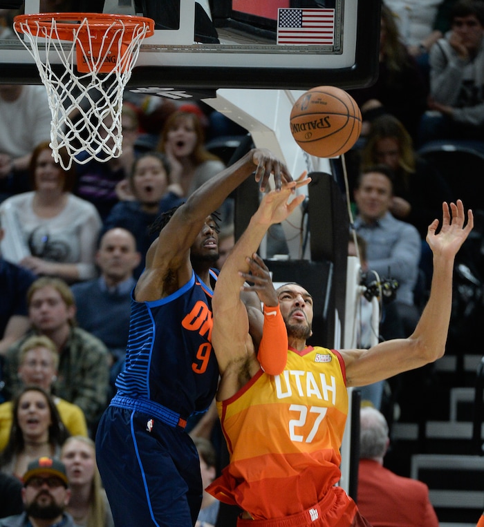 (Francisco Kjolseth  |  The Salt Lake Tribune)   Oklahoma City Thunder forward Jerami Grant (9) battles Utah Jazz center Rudy Gobert (27) in the second half of the NBA game at Vivint Smart Home Arena Sat., Dec. 22, 2018, in Salt Lake City.