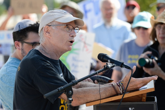 (Francisco Kjolseth  |  The Salt Lake Tribune)  Eric Goldman, founder of Utah Jews for Refugees leads a Close The Camps vigil outside of the U.S. Immigration and Customs Enforcement (ICE) field office at 2975 S. Decker Lake Drive, West Valley City, on Saturday, Aug. 10, 2019. "Because we have experienced the same type of persecution as a Jewish community we take to heart what immigrants are facing."