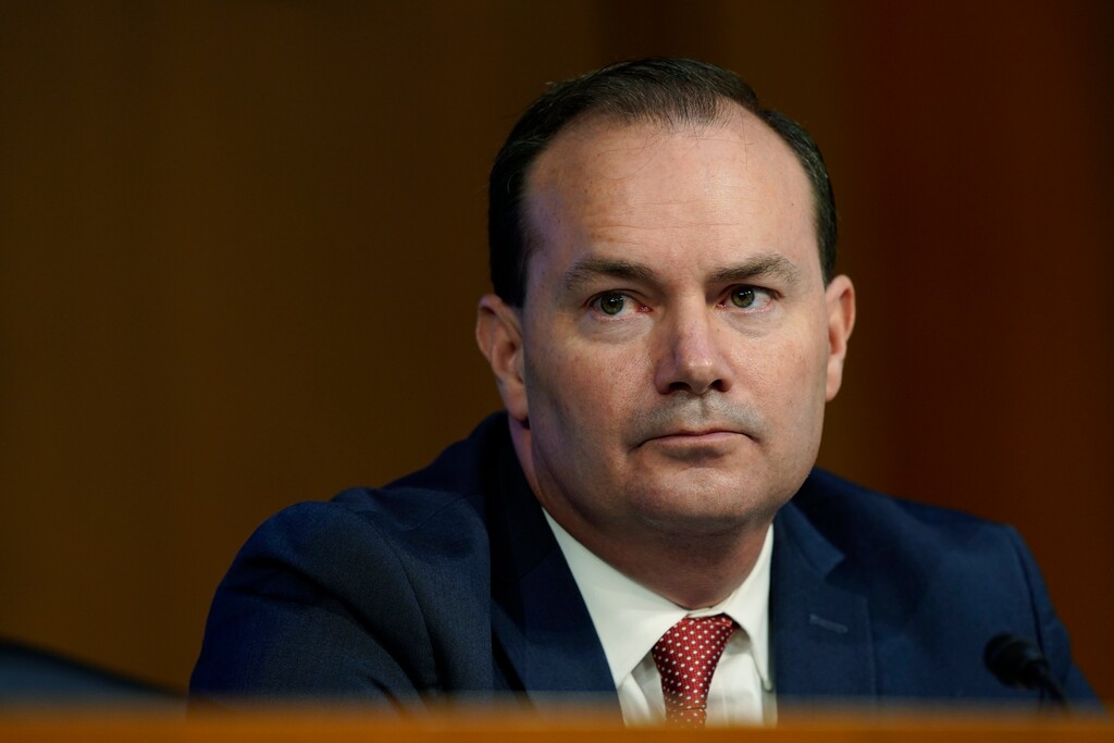 (Susan Walsh | Pool photo via AP) Sen. Mike Lee, R-Utah, listens during a confirmation hearing for Supreme Court nominee Amy Coney Barrett before the Senate Judiciary Committee on Monday, Oct. 12, 2020, on Capitol Hill.
