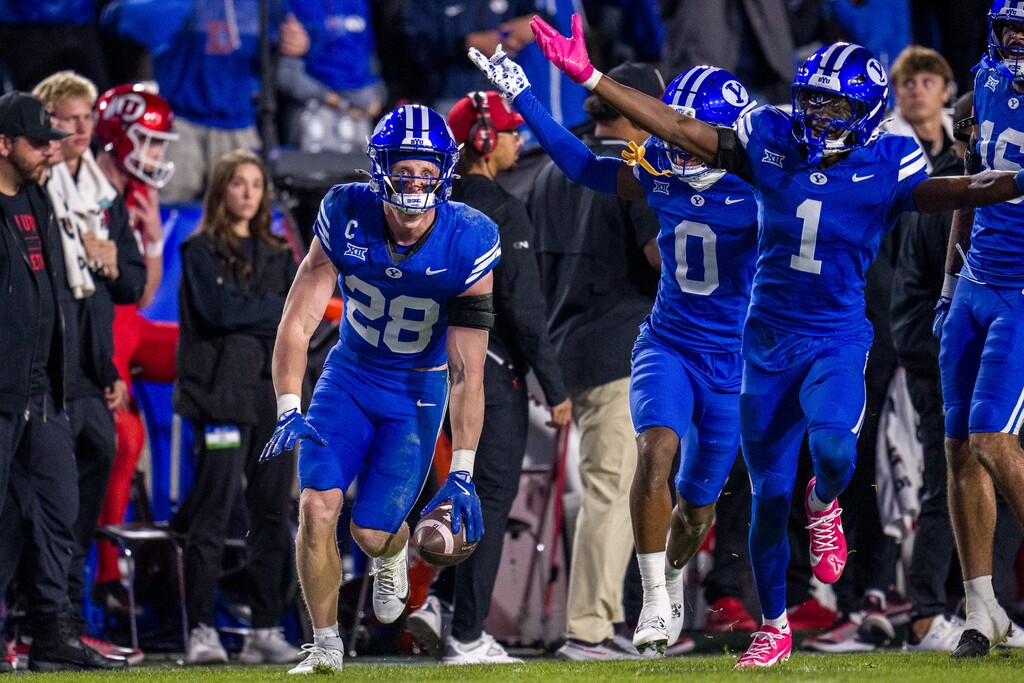 (Trent Nelson  |  The Salt Lake Tribune) BYU Cougars safety Tanner Wall (28) celebrates after intercepting a pass as BYU hosts Utah, NCAA football at LaVell Edwards Stadium in Provo on Saturday, Oct. 18, 2025.