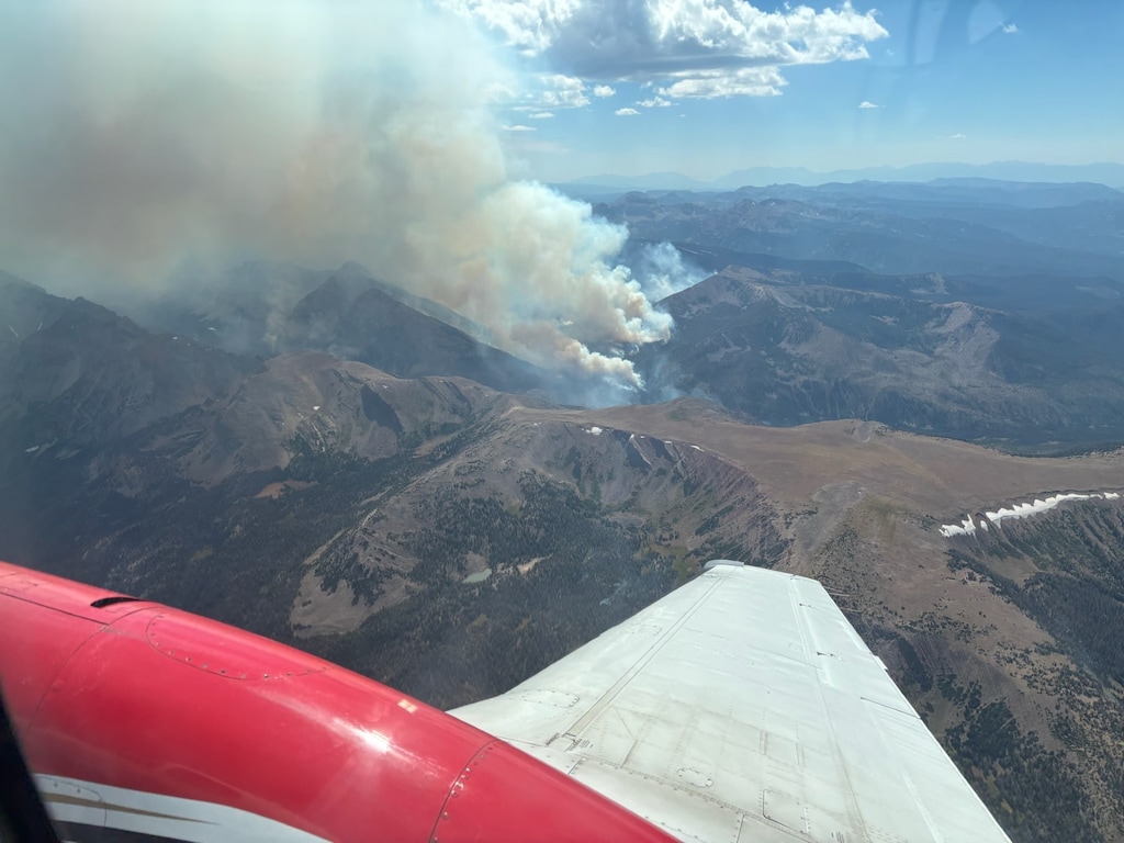 (Utah Fire Info, via X) A firefighting plane gets an aerial view of the Beulah Fire in the Uinta Mountains, Aug. 13, 2025.