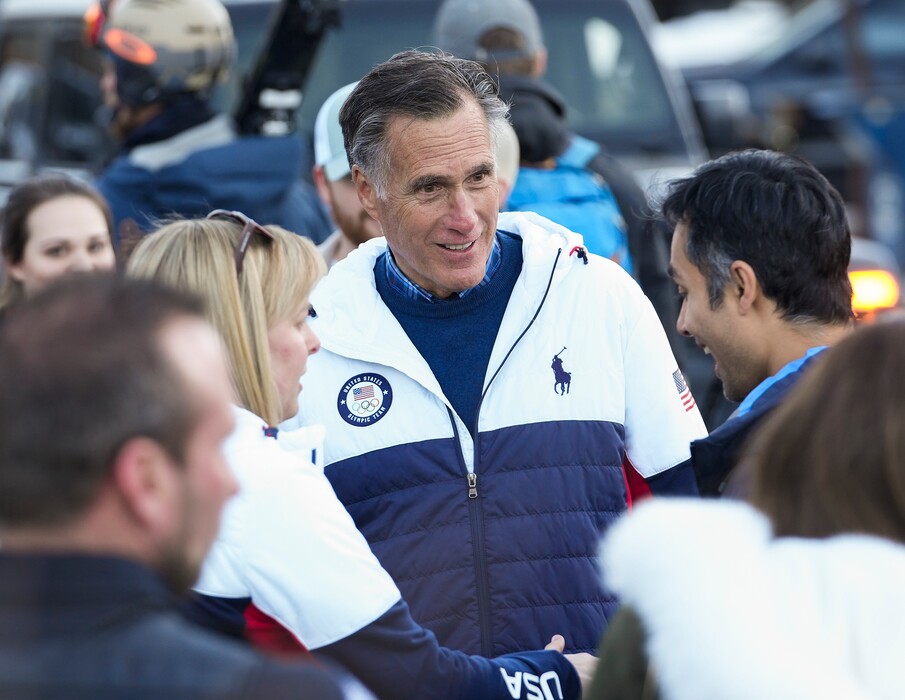 (Leah Hogsten | The Salt Lake Tribune)  U.S. Sen. Mitt Romney visits with Olympic supporters in Park City on the Bob Wells Plaza, Feb. 12, 2022.