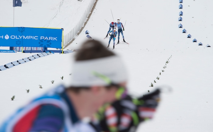 (Scott Sommerdorf   |  The Salt Lake Tribune)   
Bryan Fletcher in the red cap is in a pack of racers on his way to winning the Nordic Combined Olympic Trials in Park City, Saturday, December 30, 2017.