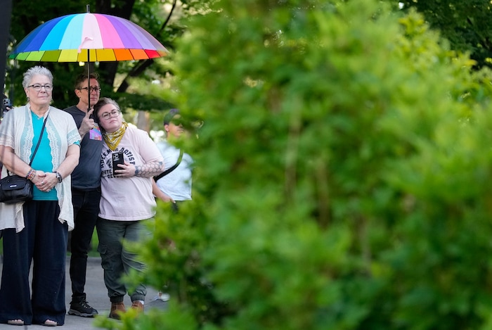 (Francisco Kjolseth | The Salt Lake Tribune) People attend the annual raising of the pride flag at City Hall to kickstart a month of festivities for Utah Pride on Friday, May 30, 2025. It is especially notable this year given the state tried to stop the pride flag from flying over government grounds.