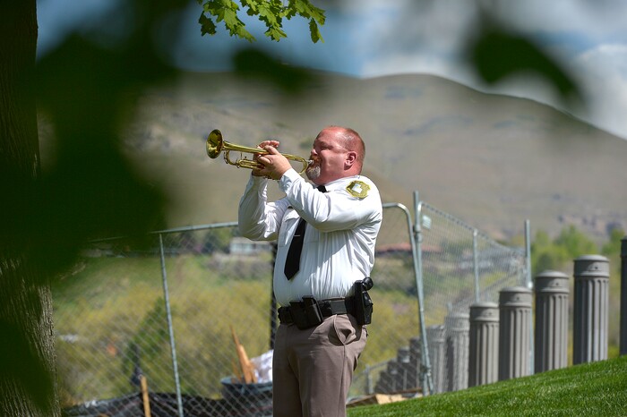 (Scott Sommerdorf | The Salt Lake Tribune)
Deputy Logan Payne sounds Taps during the Utah Law Enforcement Memorial honoring the 142 police officers killed in the line of duty during the state's history, Thursday, May 3, 2018.
No Utah law enforcement officer died in the line of duty last year.