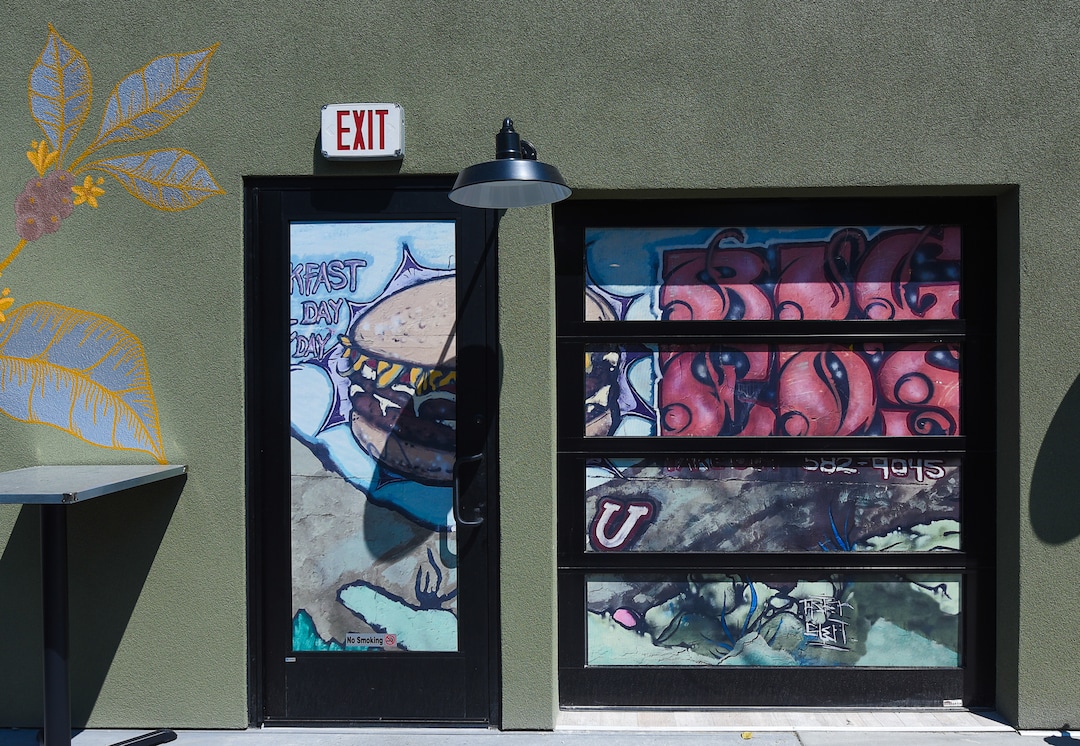 (Francisco Kjolseth  |  The Salt Lake Tribune)  A replica of the Big Ed's mural has been incorporated into the south windows at the new Publik Ed's coffee shop and restaurant.
