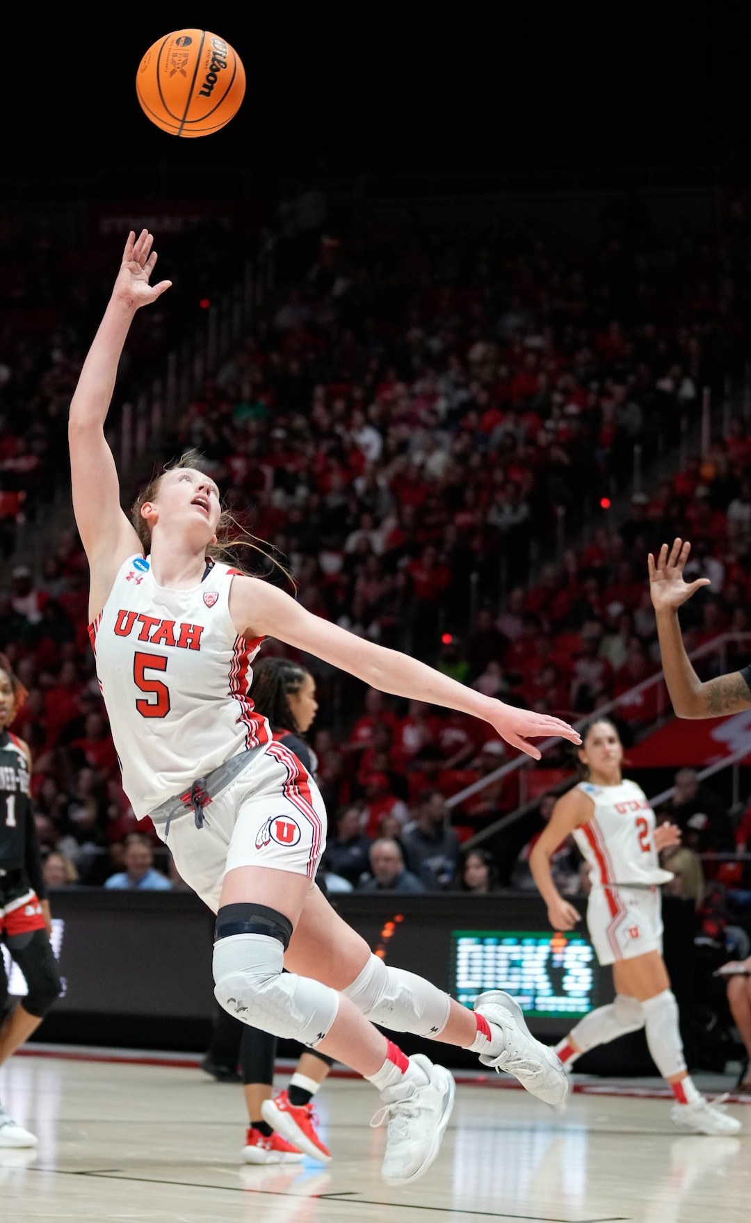 (Francisco Kjolseth | The Salt Lake Tribune) Utah Utes guard Gianna Kneepkens (5) attempts a shot against Gardner-Webb of a first-round college basketball game in the NCAA Tournament, Friday, March 17, 2023, in Salt Lake City, Utah.