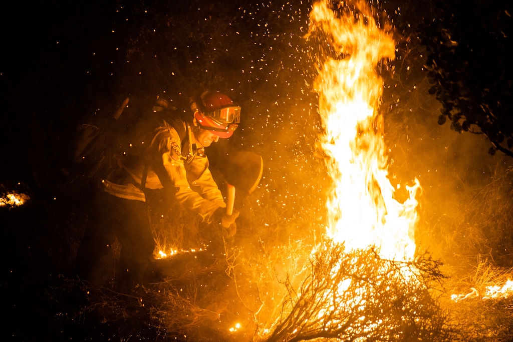 (Max Whittaker | The New York Times) A Cal Fire firefighter tries to manage a burn on the Bear Fire, part of the North Complex blaze near Oroville, Calif., on Thursday, Sept. 10, 2020. Fires continue to blaze up and down the West Coast, destroying neighborhoods and forcing mass evacuations as firefighters struggled to contain them.