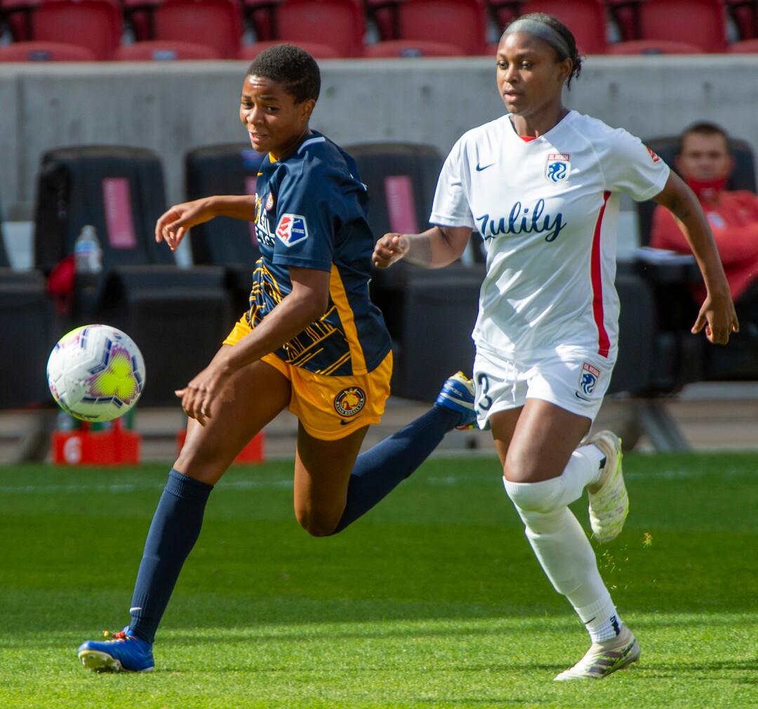(Rick Egan  |  The Salt Lake Tribune) Utah Royals FC defender Becca Moros (3) races OL Reign FC defender Taylor Smith (23) for the ball, in soccer action between Utah Royals FC and Ol Reign FC at Rio Tinto Stadium in Sandy, Saturday, Sept. 26, 2020.