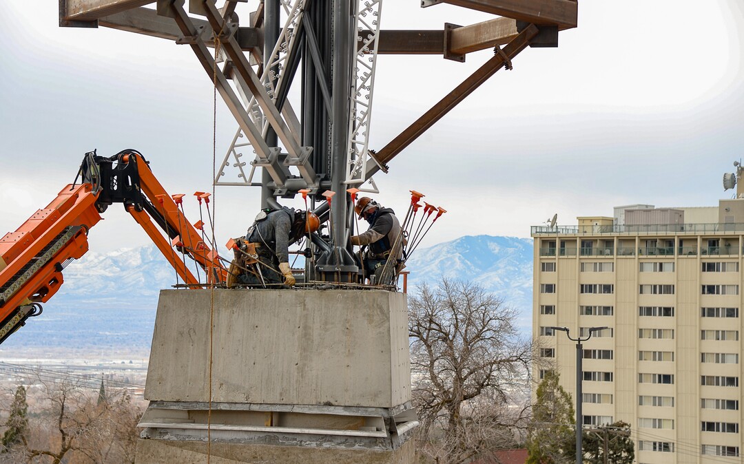 (Francisco Kjolseth  |  The Salt Lake Tribune) The Olympic cauldron is returned to the University of Utah on Friday, Jan. 29, 2021, after a refurbishment to lengthen its life span. Removed in February 2020, the cauldron was transported to an off-site location, where all 738 glass panes were removed and the complete structure was sandblasted and refinished. The refurbished structure was placed on a newly constructed, 17-foot-tall pedestal, just north of the stadium ticket office, with plans to add high-quality glass.