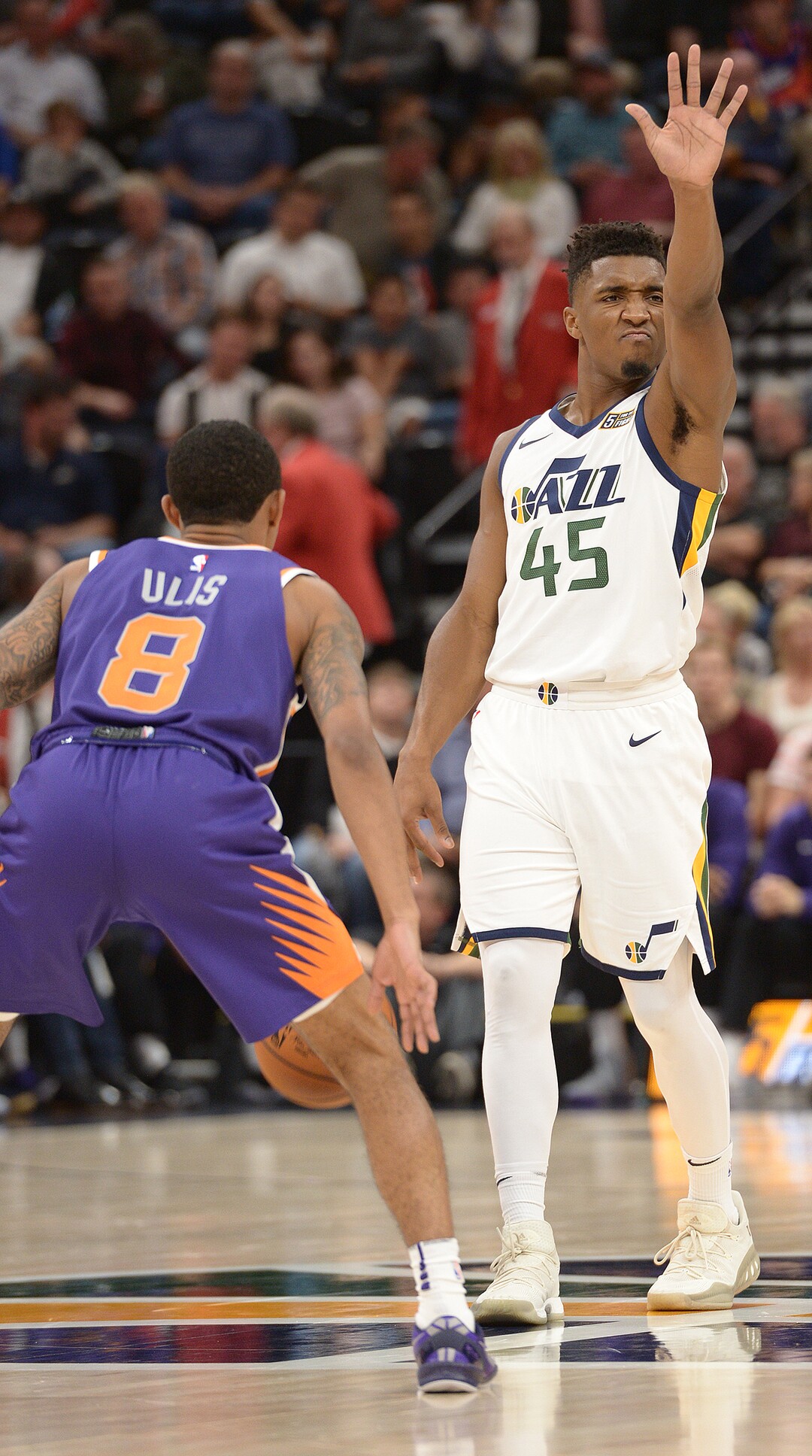 (Leah Hogsten  |  The Salt Lake Tribune)  Utah Jazz guard Donovan Mitchell (45) directs the play. The Utah Jazz defeated the Phoenix Suns 112-101 during preseason NBA basketball at Vivint Smart Home Arena in Salt Lake City, October 6, 2017.