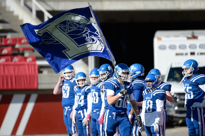 (Francisco Kjolseth  |  The Salt Lake Tribune)  Dixie takes to the field before their game with Orem in the 4A high school championship game at Rice Eccles Stadium in Salt Lake City, Friday, Nov. 16, 2018.