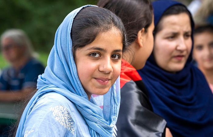 (Rick Egan | The Salt Lake Tribune) Husna Niadi gathers at Murray Park along with other people from Afghanistan, for a prayer vigil in honor of Utah’s Afghan refugees, sponsored by several local organizations, Saturday, Aug. 21, 2021.