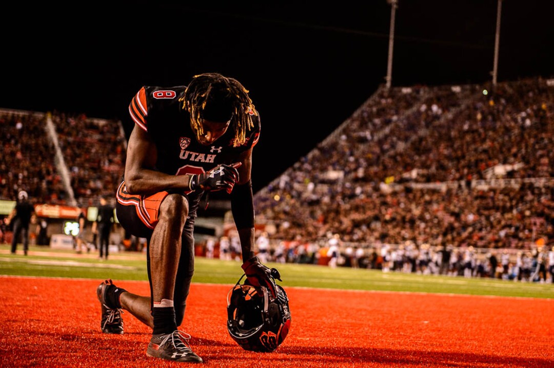 (Trent Nelson | The Salt Lake Tribune)  Utah Utes wide receiver Siaosi Mariner (8) kneels at the start of the second half as the University of Utah hosts Washington at Rice-Eccles Stadium in Salt Lake City, Saturday Sept. 15, 2018.