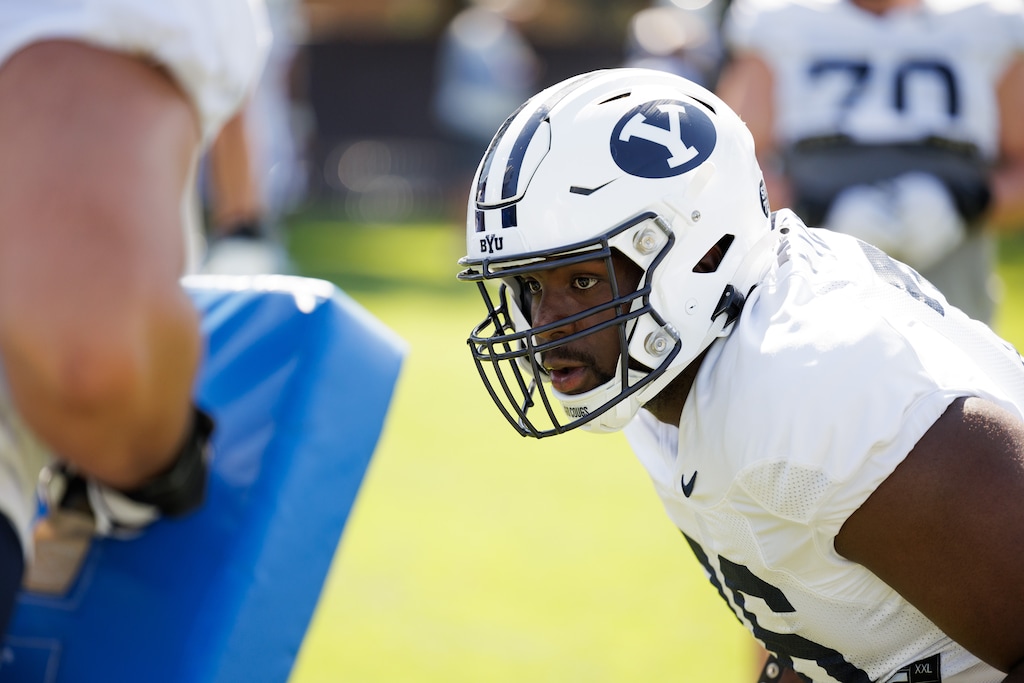(Jaren Wilkey | BYU) BYU offensive lineman Caleb Etienne participates in his first fall camp in Provo on Aug. 7, 2023.