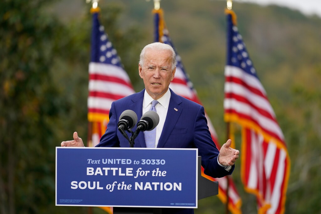 (Andrew Harnik | AP photo)
In this Oct. 27 photo, then-Democratic presidential candidate former Vice President Joe Biden speaks at Mountain Top Inn & Resort in Warm Springs, Ga. President-elect Joe Biden has evoked Franklin Delano Roosevelt in promising a remaking of America unseen since the New Deal. Pledging to emulate some of the loftiest reforms in the nation’s history has left him with towering promises to keep. And Biden hopes to deliver against the backdrop of the pandemic and searing national division.