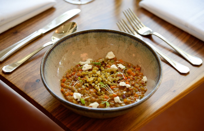 (Francisco Kjolseth  |  The Salt Lake Tribune)  The kale stem plus rye berry risotto with goat cheese and kale at Oquirrh, a new fine-dining restaurant in downtown Salt Lake City at 368 E. 100 South.