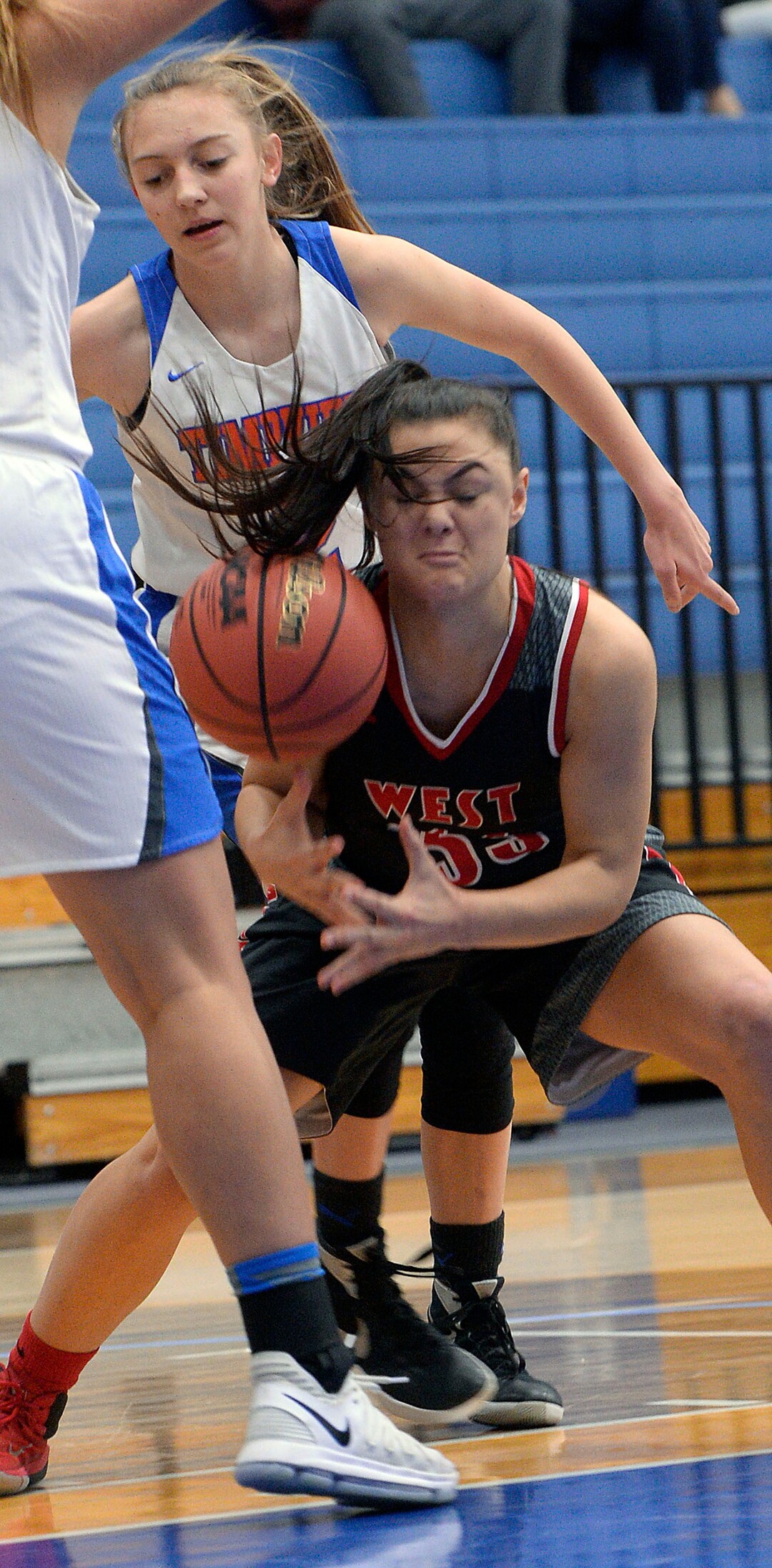 (Al Hartmann  |  The Salt Lake Tribune) 	West High School's Brianna White gets squeezed in by Timpview's Shalyn Fano, left. and Hannah Glazier, behind in the Class 5 girls' basketball playoff game Monday Feb. 19 2018