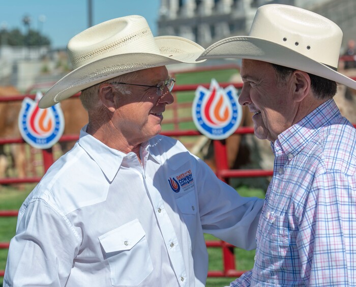 (Rick Egan  |  The Salt Lake Tribune)       Days of 47 Senior Vice President Tom Whitaker talks with Gov. Gary Herbert before a news conference on the lawn of the Utah State Capitol on the Days of 47 festivities, Tuesday, July 16, 2019.