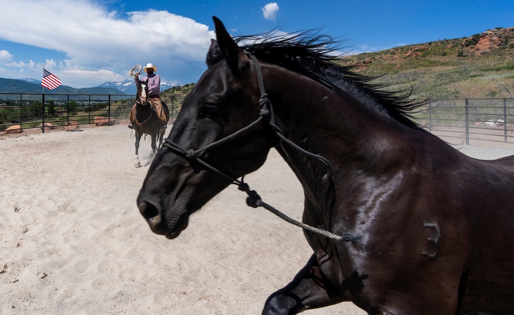 (Rick Egan | The Salt Lake Tribune)  Trevor Howard works with a horse named Comanche, at Liberty Sanctuary in the Heber Valley, on Monday, July 3, 2023.