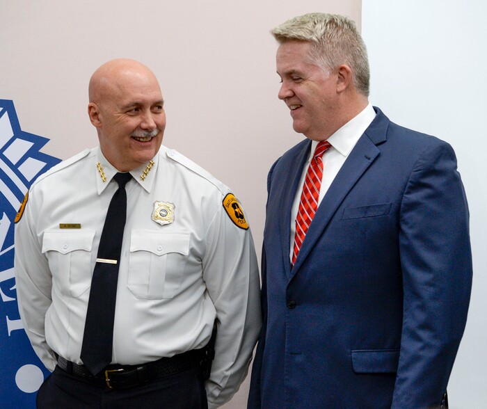 (Leah Hogsten | The Salt Lake Tribune) l-r Salt Lake City Police Chief Mike Brown and U.S. Attorney John Huber share a laugh after a joint FBI Child Exploitation Task Force press conference Tuesday to warn Utahns of the "hypersexualized virtual world" and to report the task force's findings in the fight to prevent children from being lured by internet predators and raped, kidnapped or murdered, Nov. 19, 2019. The multi-agency representatives reported that the task force netted 30 perpetrators in just four days in one month and called attention to the need for parents to police their children's online presence. "We expect you to step up and protect your children," said Gill.