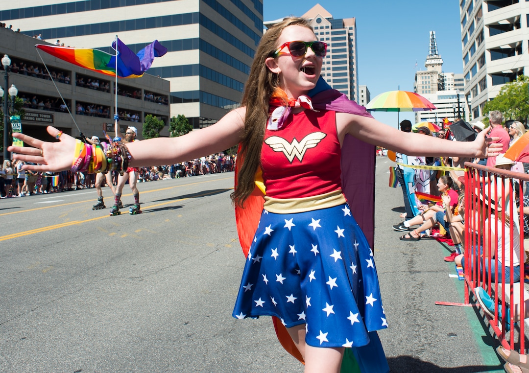 (Rick Egan  |  The Salt Lake Tribune)  Savanah offers free hugs as she walks along the Utah Pride Parade route in Salt Lake City, Sunday, June 3, 2018.
