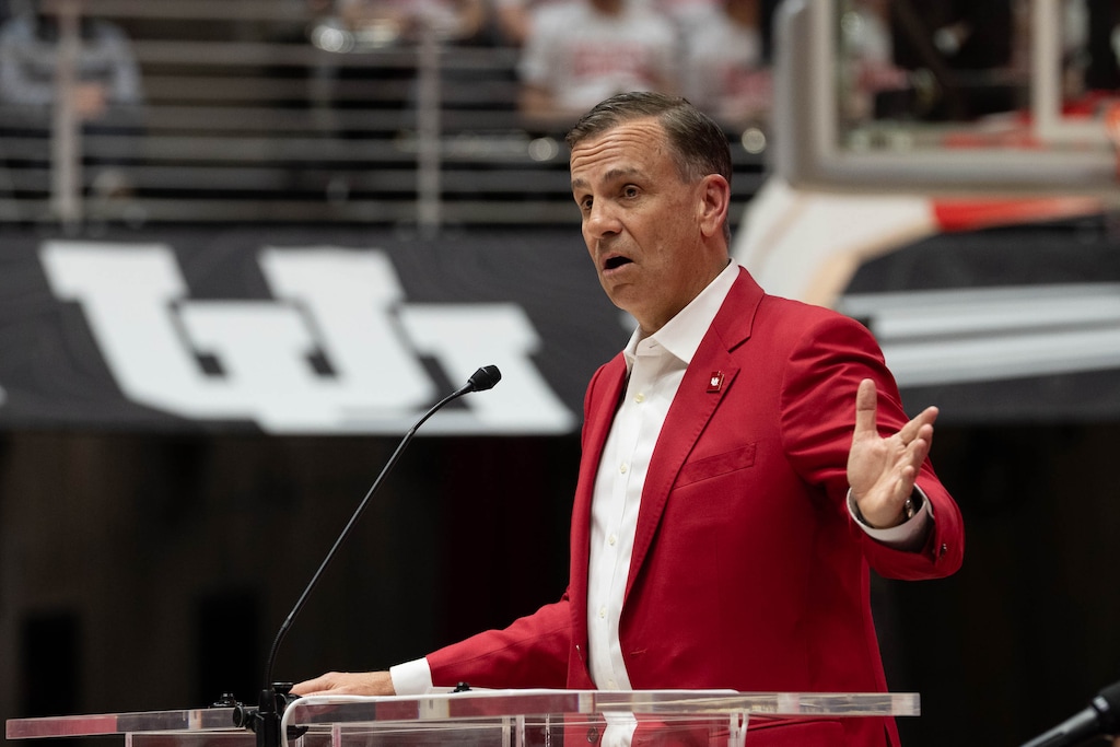 (Francisco Kjolseth  | The Salt Lake Tribune) University of Utah Athletic Director Mark Harlan helps introduce former Ute player Alex Jensen as new head coach of the Utah men’s basketball team at the Huntsman Center on Monday, March 17, 2025.