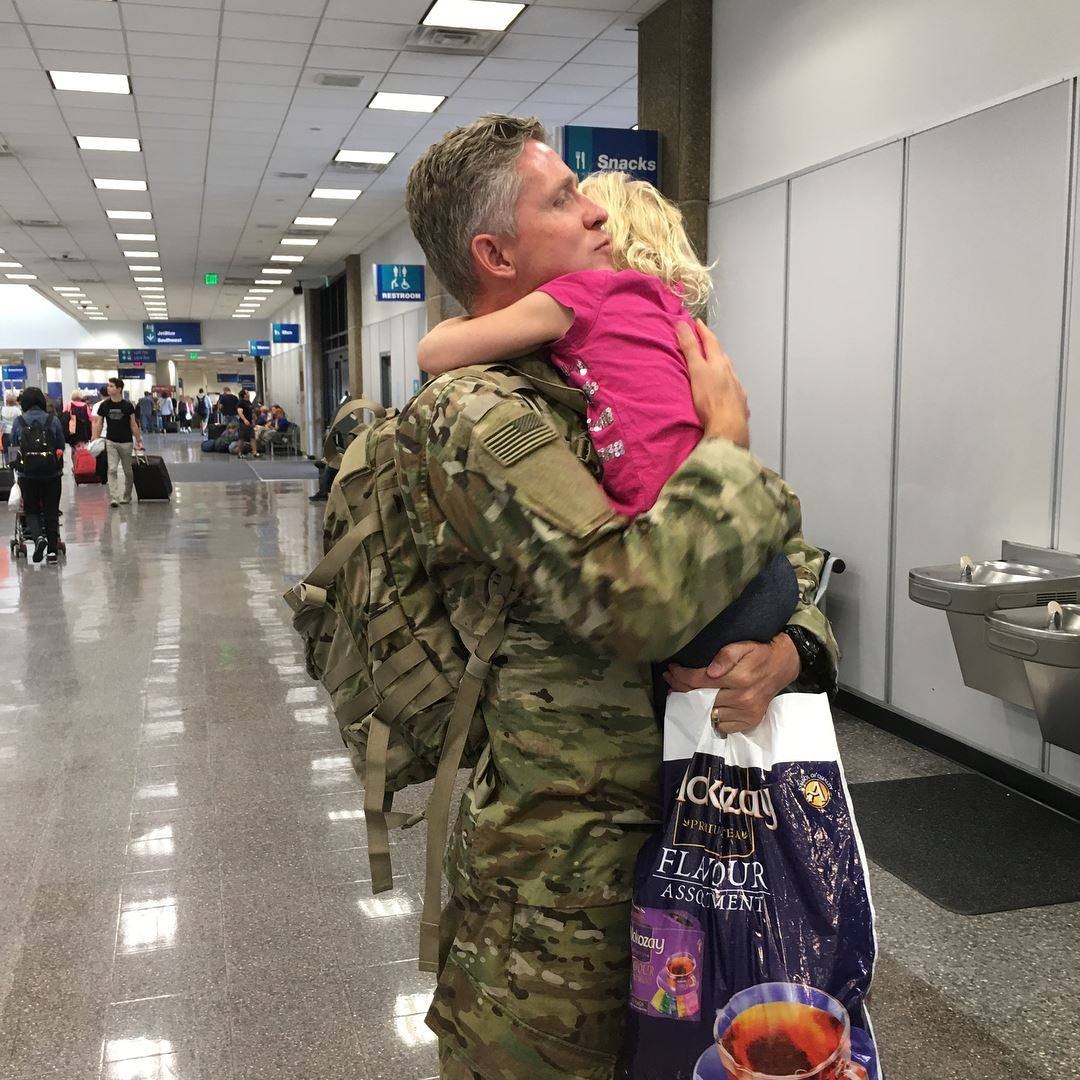 (courtesy of the North Ogden Discussion Facebook page) "God bless you all and see you on the flip side! --Major Taylor" That's how North Ogden Mayor Brent Taylor signed off on a Facebook post that included this picture of him hugging a daughter at the end of his two-week leave in August 2018. He was killed in an insider attack in Afghanistan in November 2018.