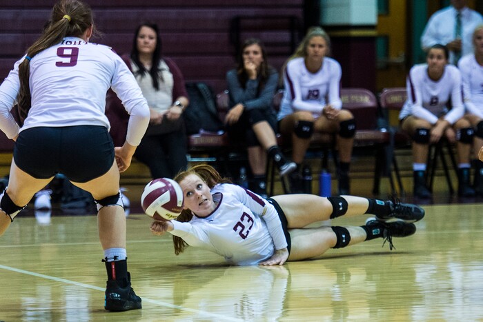 (Chris Detrick  |  The Salt Lake Tribune)    Lone Peak's Emma Ricks (23) dives for the ball during the volleyball match at Lone Peak High School Tuesday, September 5, 2017. 