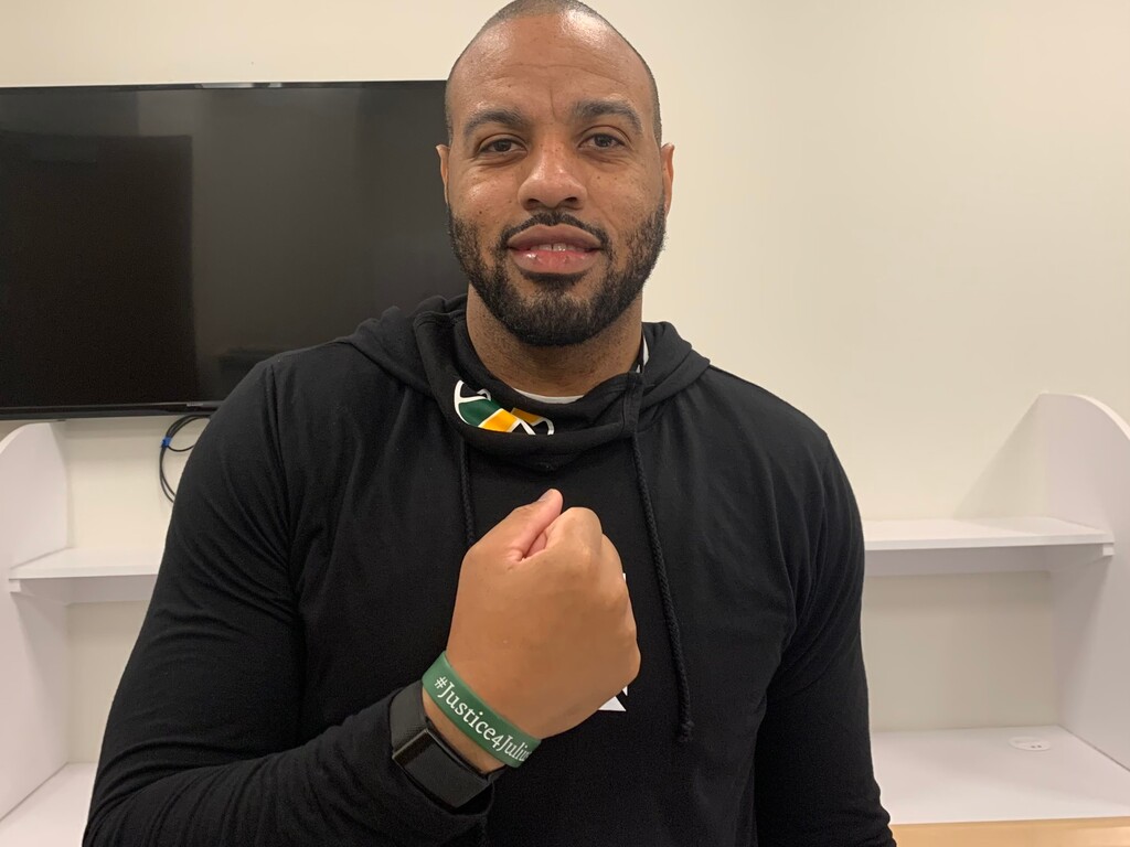 (Eric Walden  |  The Salt Lake Tribune) Utah Jazz assistant coach Irv Roland shows off his "Justice for Julius" wristband, just days ahead of the death row convict's scheduled execution in Oklahoma.
