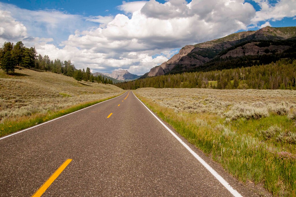 In this July 22, 2014 photo provided by Vince Swagerty, shows Yellowstone National Park in Wyo. The prospect of streaming wireless service deep inside Yellowstone National Park is re-igniting the debate over technologys boundaries in an increasingly digital world. Park officials are in discussions with CenturyLink about installing a $34 million fiber optic line through neighboring Grand Teton National Park and into Yellowstones interior. That would dramatically improve connectivity in certain areas for mobile devices ranging from smartphones to tablets. (AP Photo/Vince Swagerty)