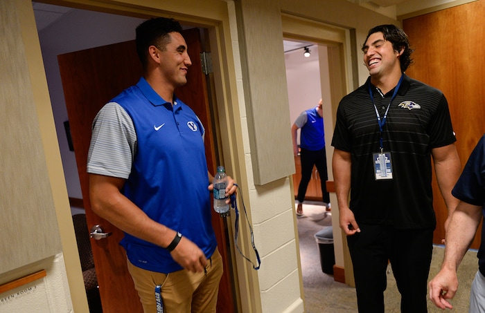 (Francisco Kjolseth  |  The Salt Lake Tribune)  Corbin Kaufusi, left, defensive lineman for BYU is joined by his brother former BYU football player Bronson Kaufusi, during the eighth-annual football media day at the BYU-Broadcasting Building on Friday, June 22, 2018.