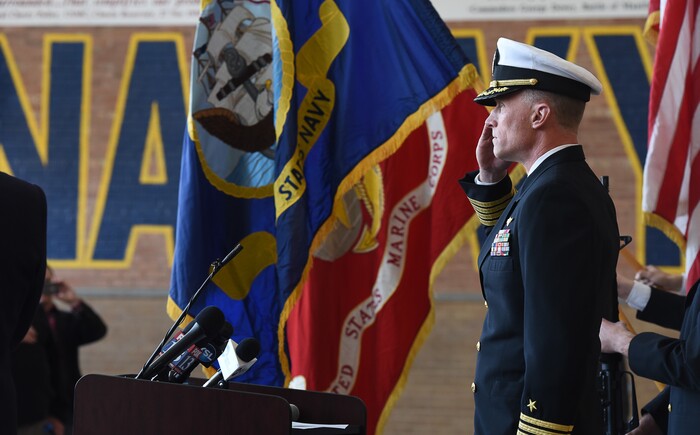 (Francisco Kjolseth  |  The Salt Lake Tribune)  Mark Springer, USN, commanding officer and professor of Naval Science at the University of Utah, salutes during the posting of the colors at the Naval Science building on campus on Thursday, Dec. 7, 2017, during a short ceremony to mark the return of the bell from the USS Utah, one of the first ships lost during the attack on Pearl Harbor. 