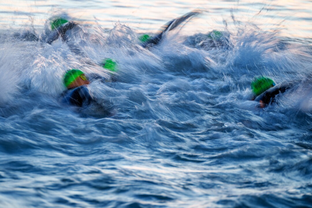 (Trent Nelson  |  The Salt Lake Tribune) Competitors swim at Sand Hollow Reservoir to start the Ironman World Championship triathlon in St. George on Saturday, May 7, 2022.