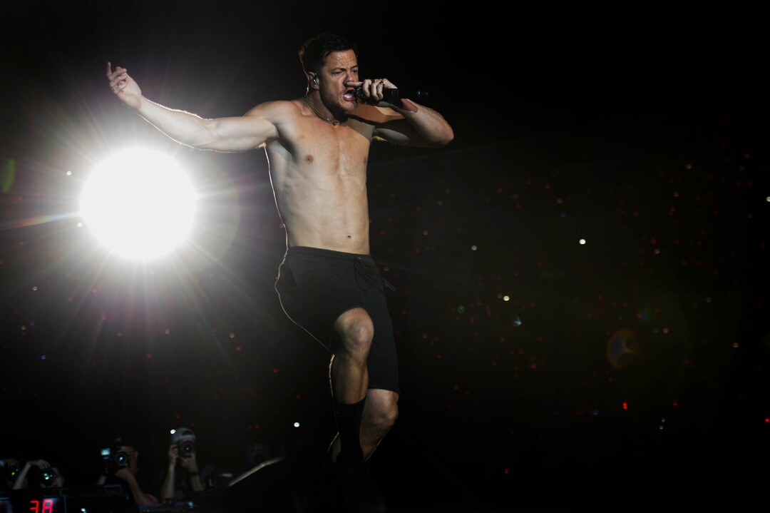 (Rick Egan  |  The Salt Lake Tribune)     Dan Reynolds performs with Imagine Dragons, at the Loveloud Festival at Rice-Eccles Stadium, Saturday, July 28, 2018.