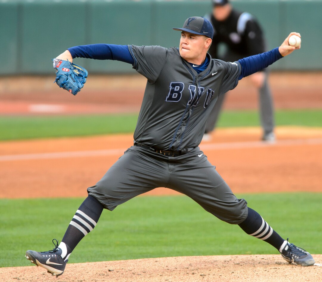 (Steve Griffin  |  The Salt Lake Tribune)  BYU pitcher Bo Burrup fires a pitch during the BYU versus Utah baseball game at Smiths Ballpark in Salt Lake City Tuesday April 3, 2018.