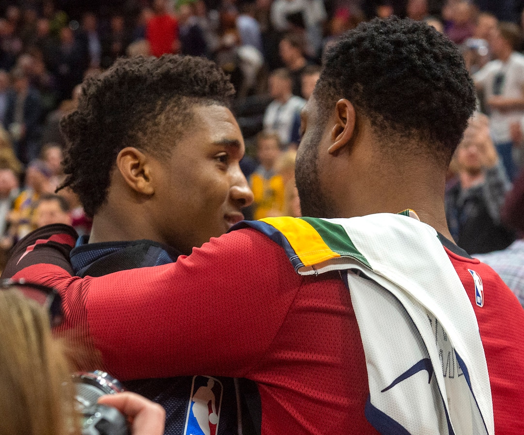 (Rick Egan  |  The Salt Lake Tribune)     Utah Jazz guard Donovan Mitchell (45) hugs Miami Heat guard Dwyane Wade (3) after the game between Utah Jazz and Miami Heat, at Vivint Smart Home Arena Wednesday, Dec. 12, 2018.