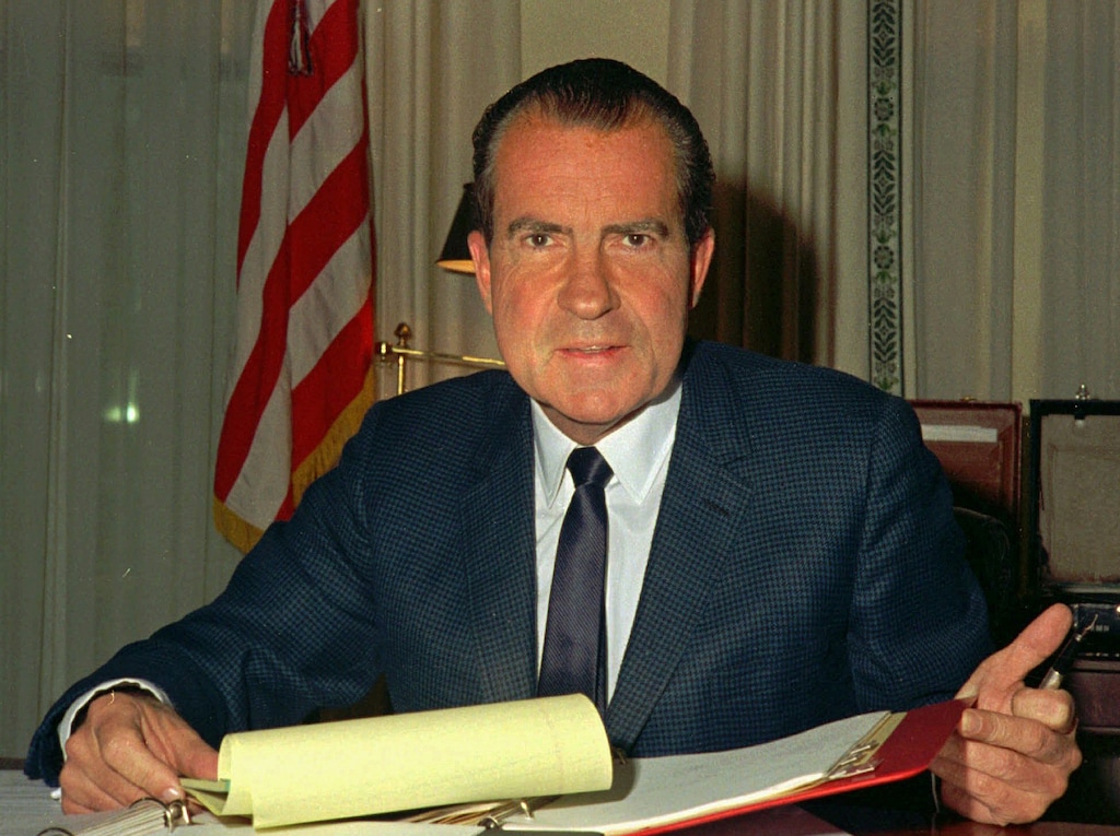 FILE - In this Feb. 16, 1969, file photo, President Richard M. Nixon, is shown at his desk in the White House. For the first time since an Oval Office taping system was removed by Nixon’s chief of staff nearly 44 years ago, a president has hinted that White House conversations might again be secretly recorded. If so, President Donald Trump is following a problematic precedent. While several presidents secretly recorded conversations without problems, the practice is most associated with Nixon. His recordings became prime evidence during the Watergate investigation that ultimately led to his resignation. Sooner or later, recordings are likely to become public.(AP Photo/File)