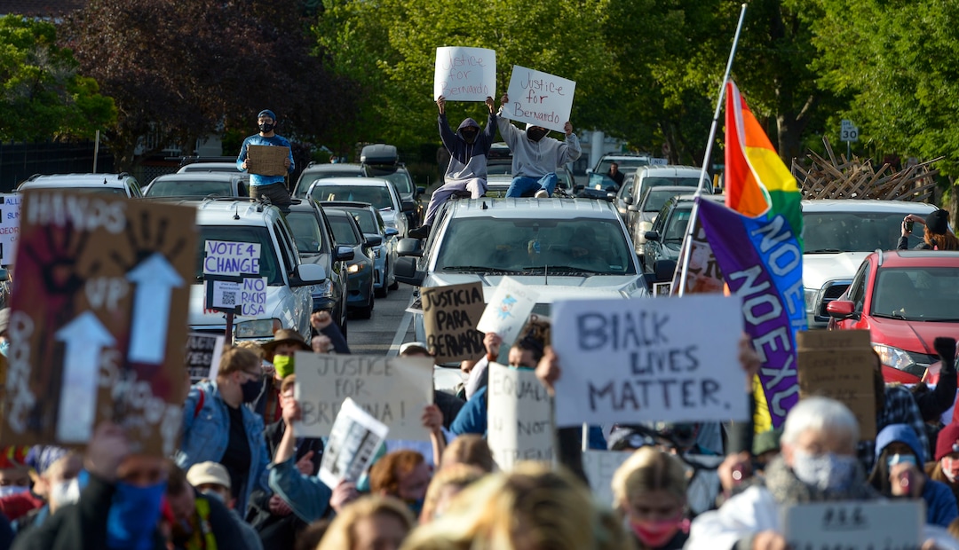 (Leah Hogsten  |  The Salt Lake Tribune) Demonstrators marched from the Utah Capitol down State Street, stopping at every intersection for five minutes in honor of George Floyd, June 8, 2020.