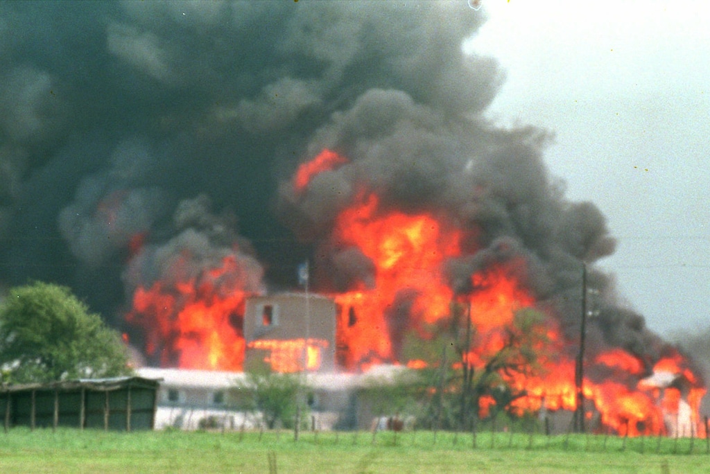 (AP Photo/Ron Heflin, File) Fire engulfs the Branch Davidian compound near Waco, Texas, in this April 19, 1993, file photo.