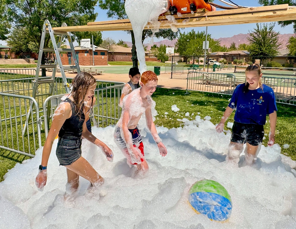 (Mark Eddington | The Salt Lake Tribune) Kids play in a water feature at Ivins' Unity Park on Wednesday, July 10, 2024.