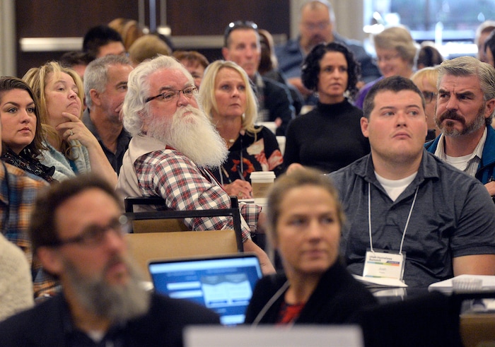 (Al Hartmann  |  The Salt Lake Tribune) 	
Utah homeless service providers listen to panel discussion about the long-term plan to add three new homeless shelters and close the shelter at 210 S. Rio Grande St. — and about how the $67 million Operation Rio Grande has affected that long-term plan at Utah's 14th Annual Homelessness Summit in Salt Lake City Wednesday Oct. 11.
Panel included Lt. Governor Spencer Cox, Speaker of House Greg Hughes,Salt Lake City Mayor Jackie Biskupski, advocate Pamela Atkinson, and Josh Romney.  