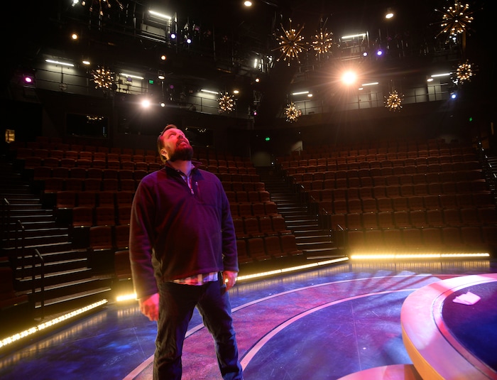 (Al Hartmann | The Salt Lake Tribune) Kacey Udy, Hale Centre Theatre production designer, checks out the stage inside the Sorenson Legacy Jewel Box Stage, the smaller of the two theaters at the new facility in Sandy. He's working to help stage "Aida," the first show on the soon-to-open Centre Stage. Udy, who describes himself as a farm boy from Snowville, helped design the new theater. The show will open on his 39th birthday.