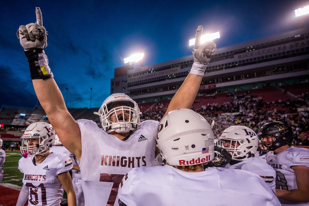 (Trent Nelson  |  The Salt Lake Tribune) Lone Peak's Joe Brown (79) points to the sky as Lone Peak celebrates their win over Corner Canyon in the 6A high school football championship game in Salt Lake City on Friday, Nov. 19, 2021. He recently committed to BYU after decommitting from the University of Virginia.