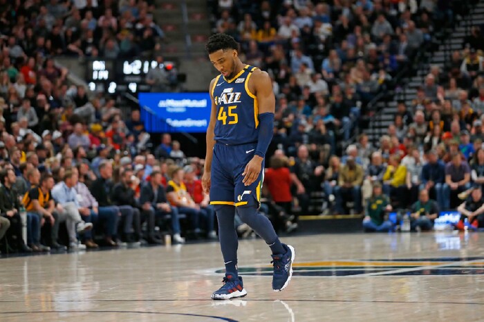 Utah Jazz guard Donovan Mitchell (45) walks up court in the second half during an NBA basketball game against the Phoenix Suns Monday, Feb. 24, 2020, in Salt Lake City. (AP Photo/Rick Bowmer)