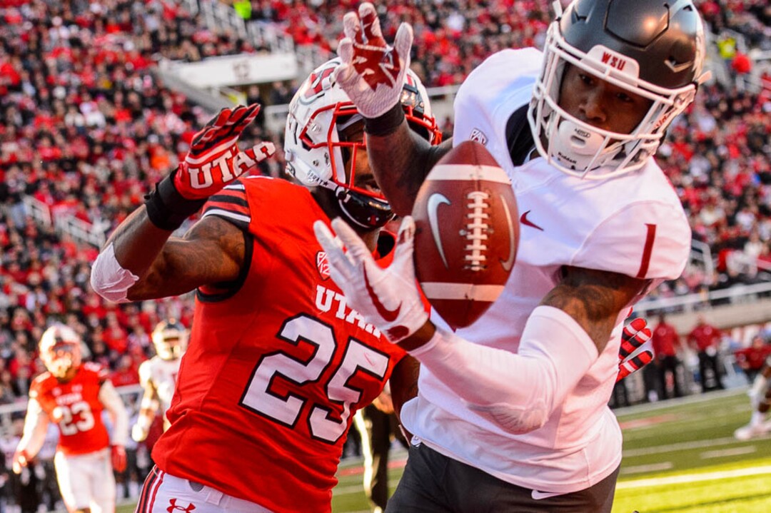 (Trent Nelson | The Salt Lake Tribune)  Utah Utes defensive back Casey Hughes (25) and Washington State Cougars wide receiver Davontavean Martin (1) reach for a pass that went incomplete as the University of Utah hosts Washington State, NCAA football in Salt Lake City, Saturday November 11, 2017.