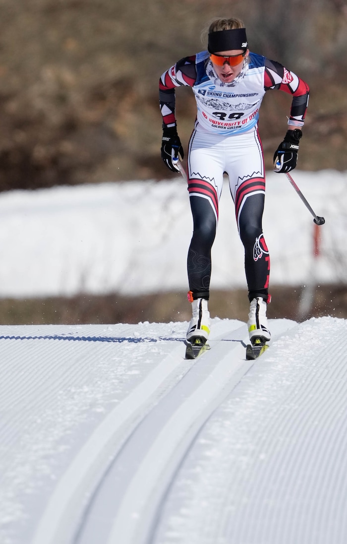 (Francisco Kjolseth | The Salt Lake Tribune) Novie McCabe  of the University of Utah races to a first place finish as she competes in the women’s 5K classic in the NCAA Skiing Championships held at the Soldier Hollow Nordic Center on Thursday, March 10, 2022 in Midway, Utah.