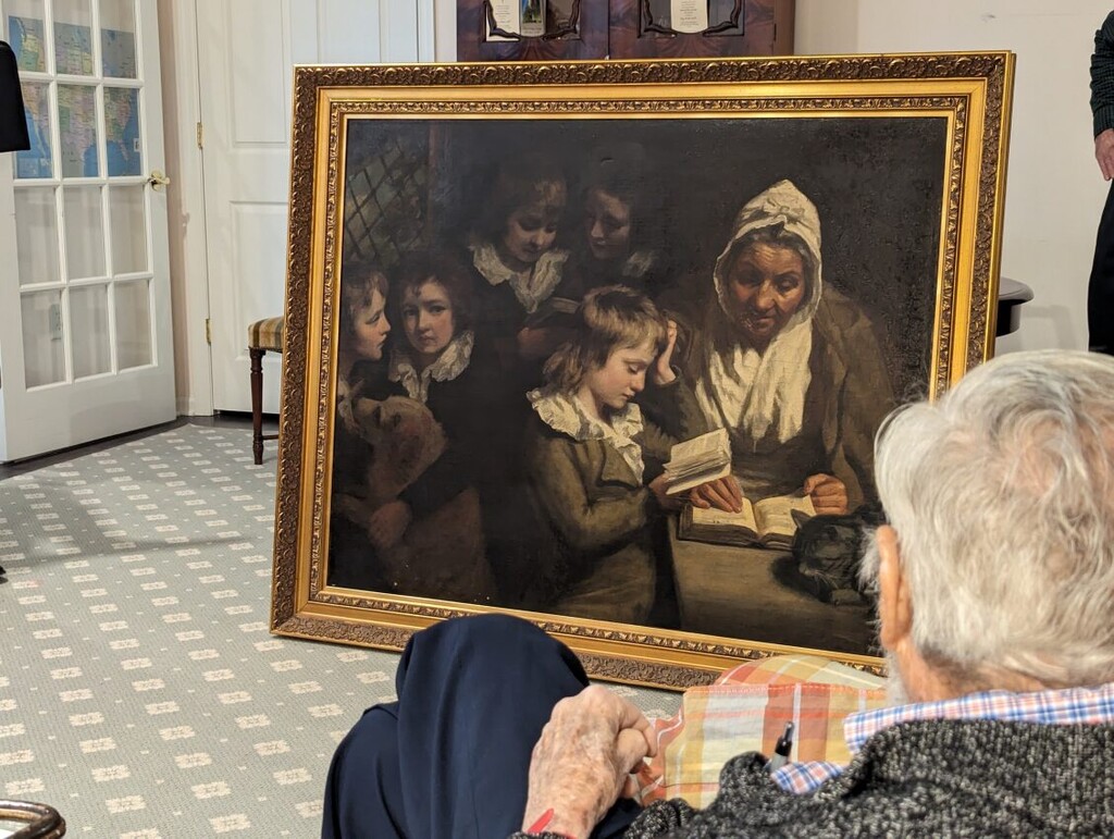 (FBI) Dr. Francis Wood, 96, admires the John Opie painting, "The Schoolmistress", stolen from his parents' Newark, New Jersey home in 1969 and recently returned to him as the rightful owner.