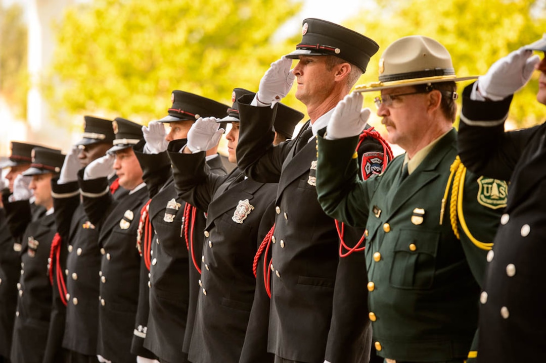 (Trent Nelson | The Salt Lake Tribune)  Honor Guard at the funeral services for Battalion Chief Matthew Burchett at the Maverik Center in West Valley City, Monday Aug. 20, 2018.